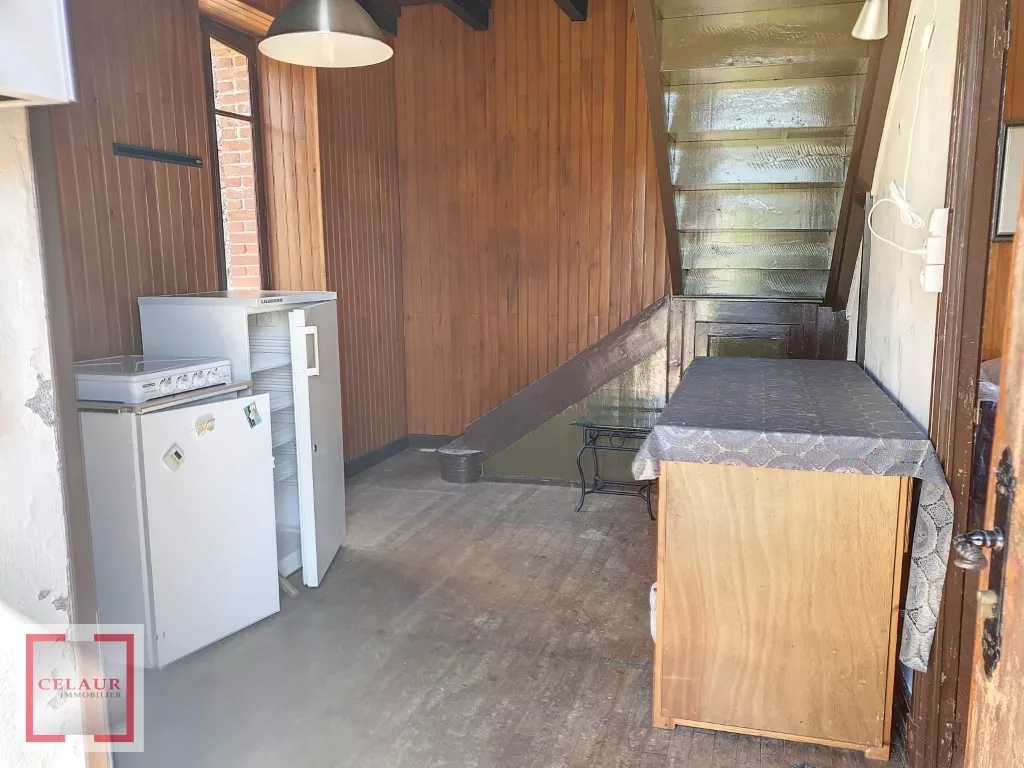 GRANGE AMENAGEE ET MAISON SUR UN TERRAIN DE 13392 M²