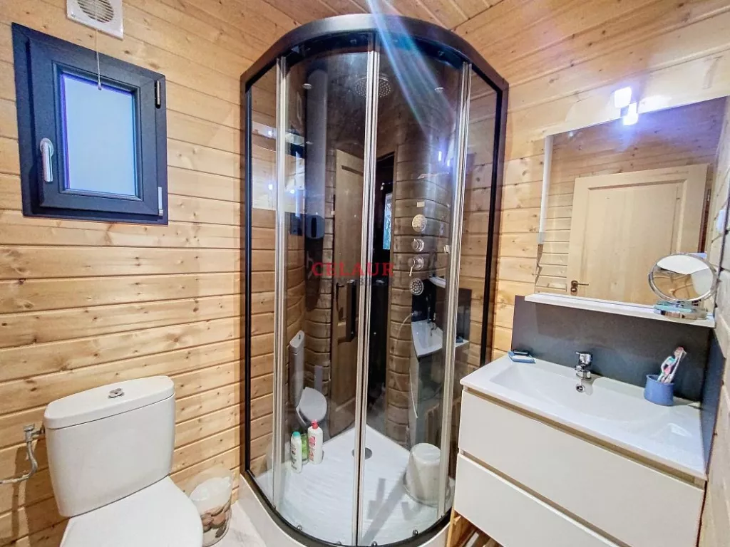 WOODEN HOUSE OF 2022 ON 5041 M&sup2; OF WOOD