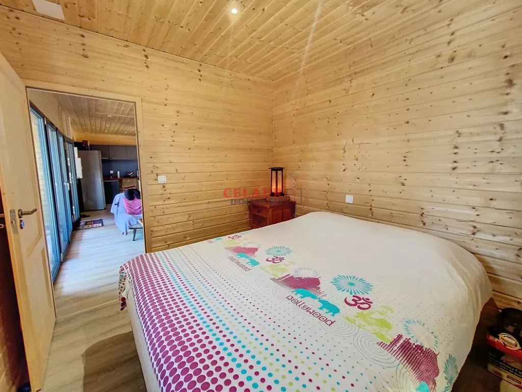 WOODEN HOUSE OF 2022 ON 5041 M&sup2; OF WOOD