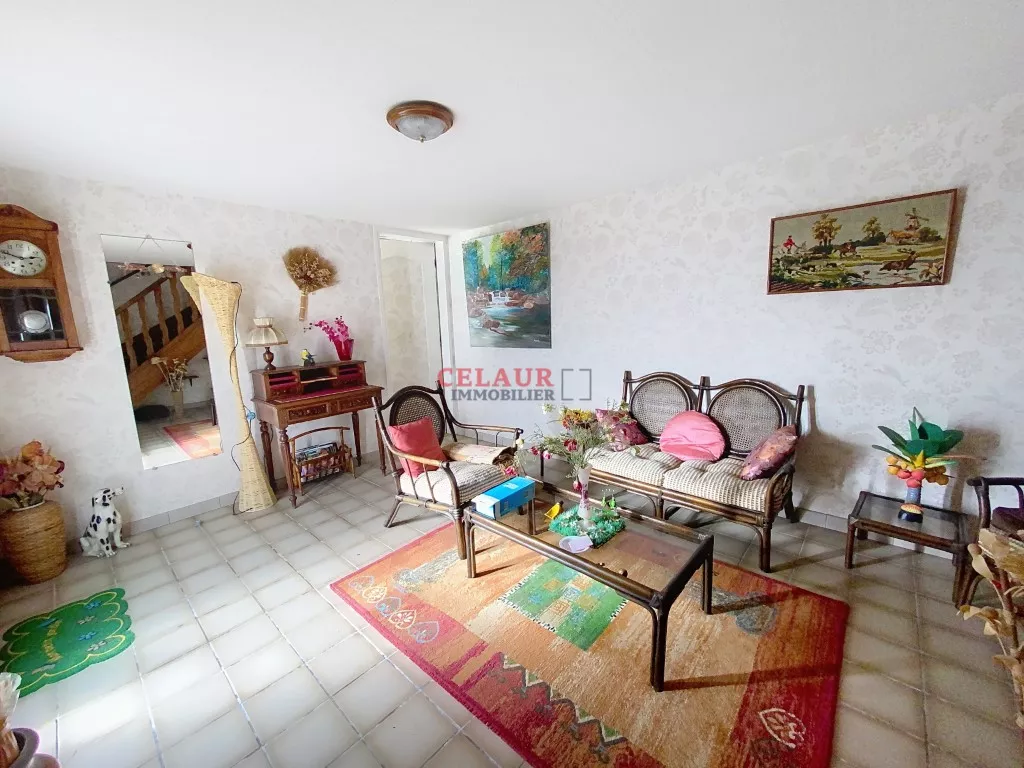 Maison située à priximité des commerces et des écoles