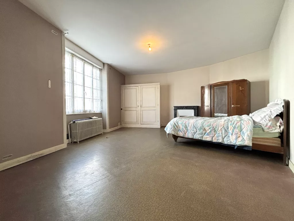 Maison de plain-pied au coeur de ville