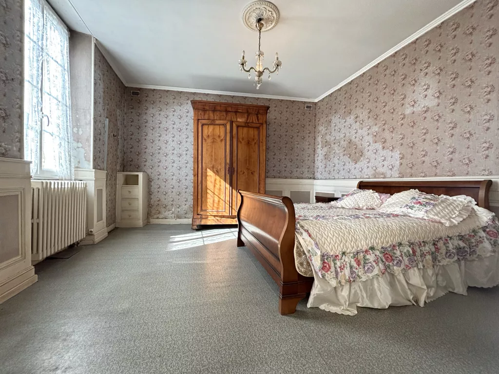 Maison de plain-pied au coeur de ville