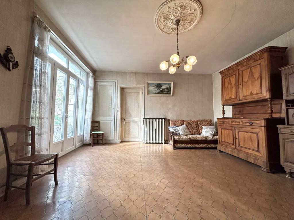 Maison de plain-pied au coeur de ville