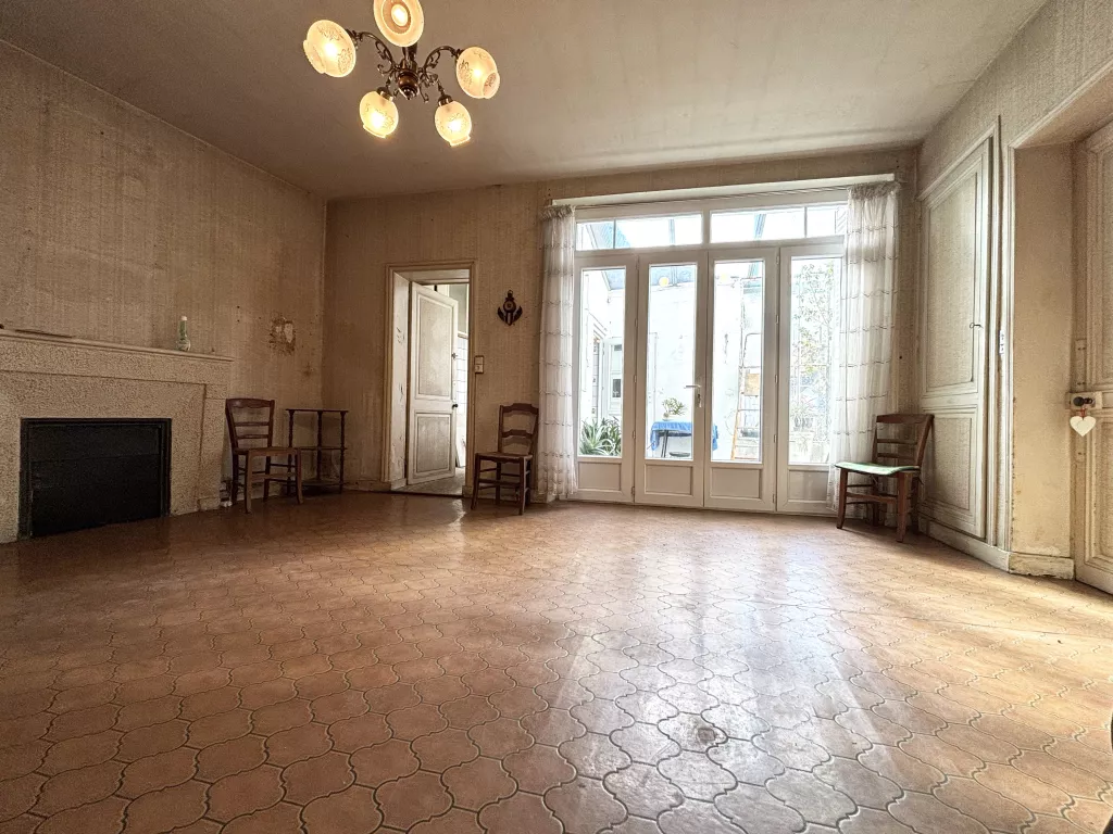 Maison de plain-pied au coeur de ville