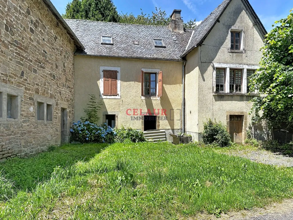 PROPRIETE EN PIERRE AVEC GRANGE A RESTAURER