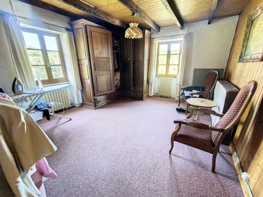 Maison en pierre avec vue