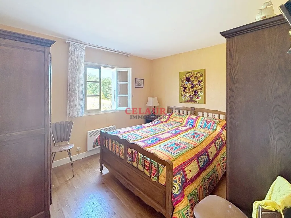 MAISON EN PIERRE SUR 2085 M&sup2; DE JARDIN AVEC GARAGE