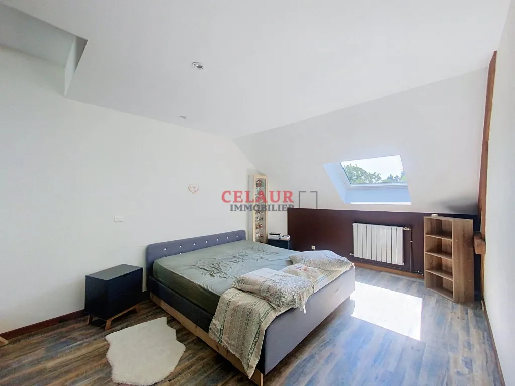 MAISON FAMILIALE AVEC 9000 M&sup2;