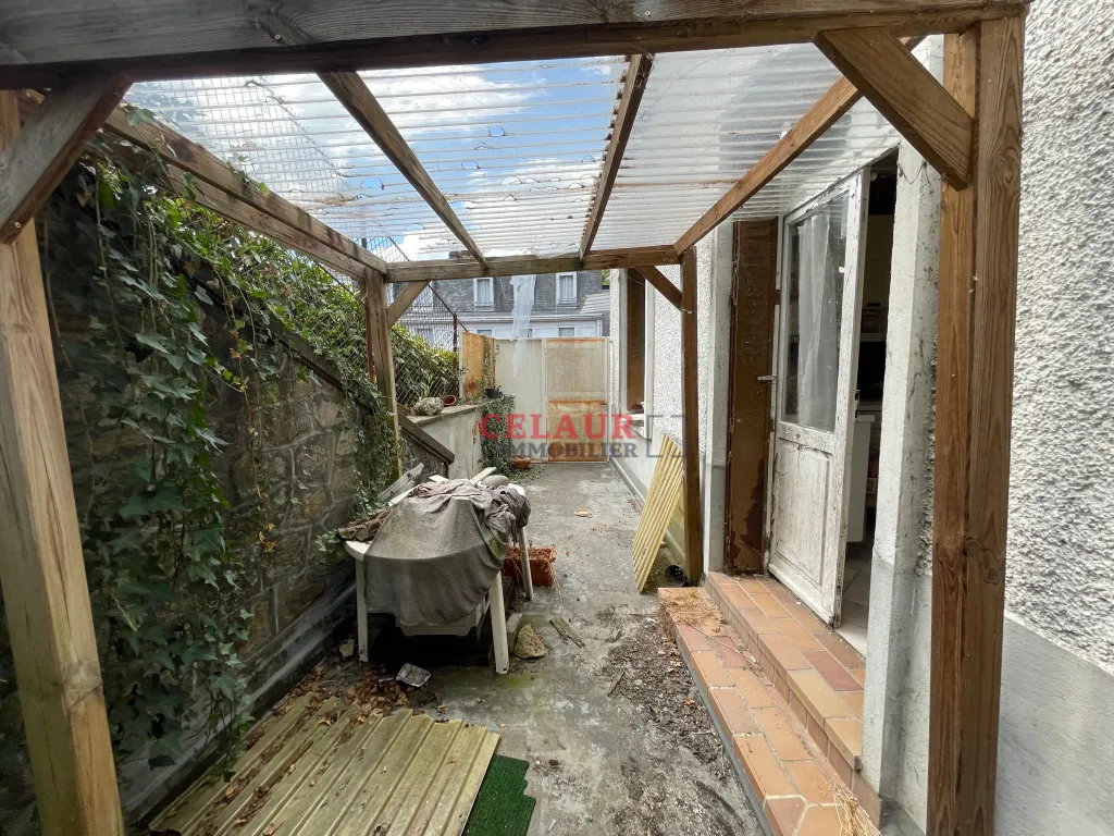 IMMEUBLE AVEC JARDIN EN CENTRE VILLE