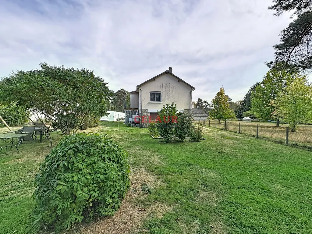 MAISON D'HABITATION ET TERRAIN CLOS