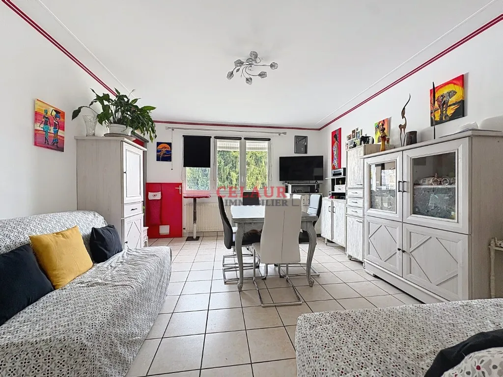 MAISON D'HABITATION ET TERRAIN CLOS