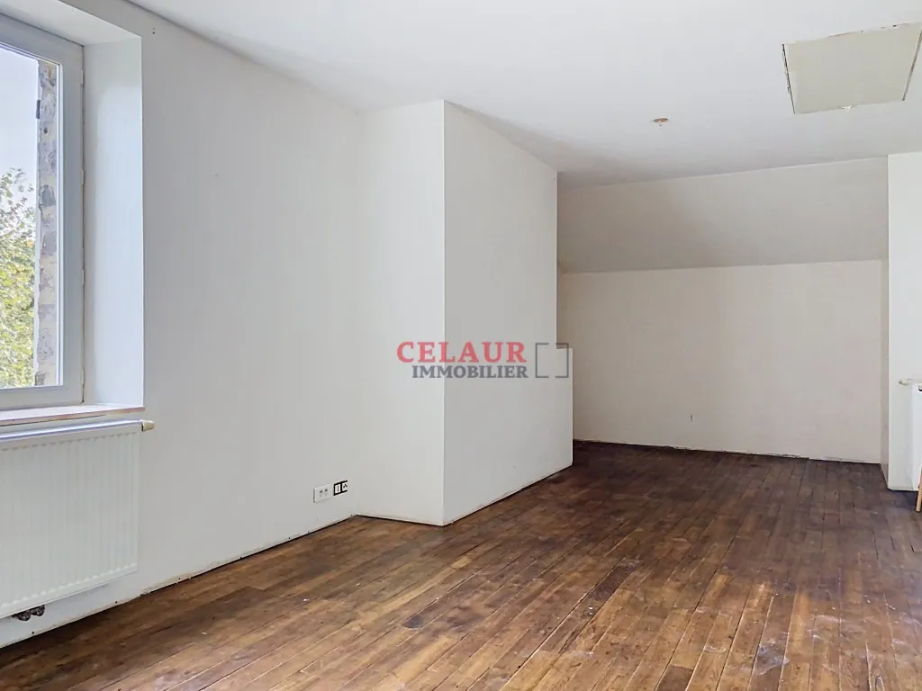 CHARMANTE MAISON AVEC JARDIN